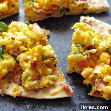 Quick Tortilla Breakfast Pizza 8 A delicious breakfast pizza with ham, eggs, onions, peppers, & cheese on a tortilla.