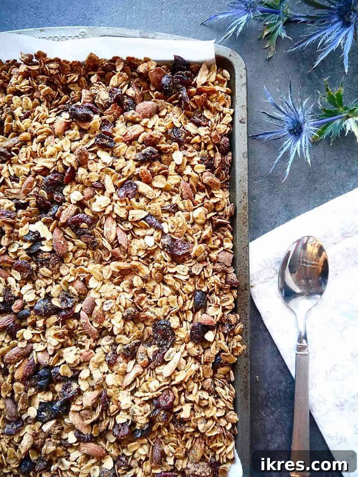 Almond granola with olive oil in a pan, after baking and cooling.