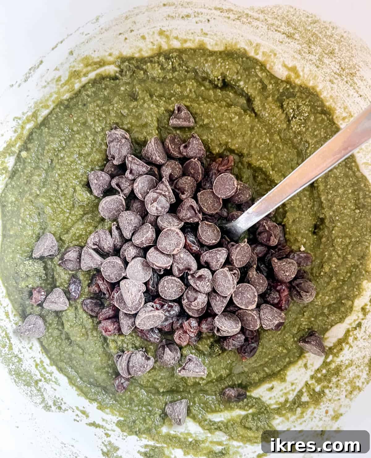 Almond Flour Matcha Brownies: A Paleo, Gluten-Free & Dairy-Free Delight 8 Chocolate chips and raisins folded into the green matcha brownie batter.