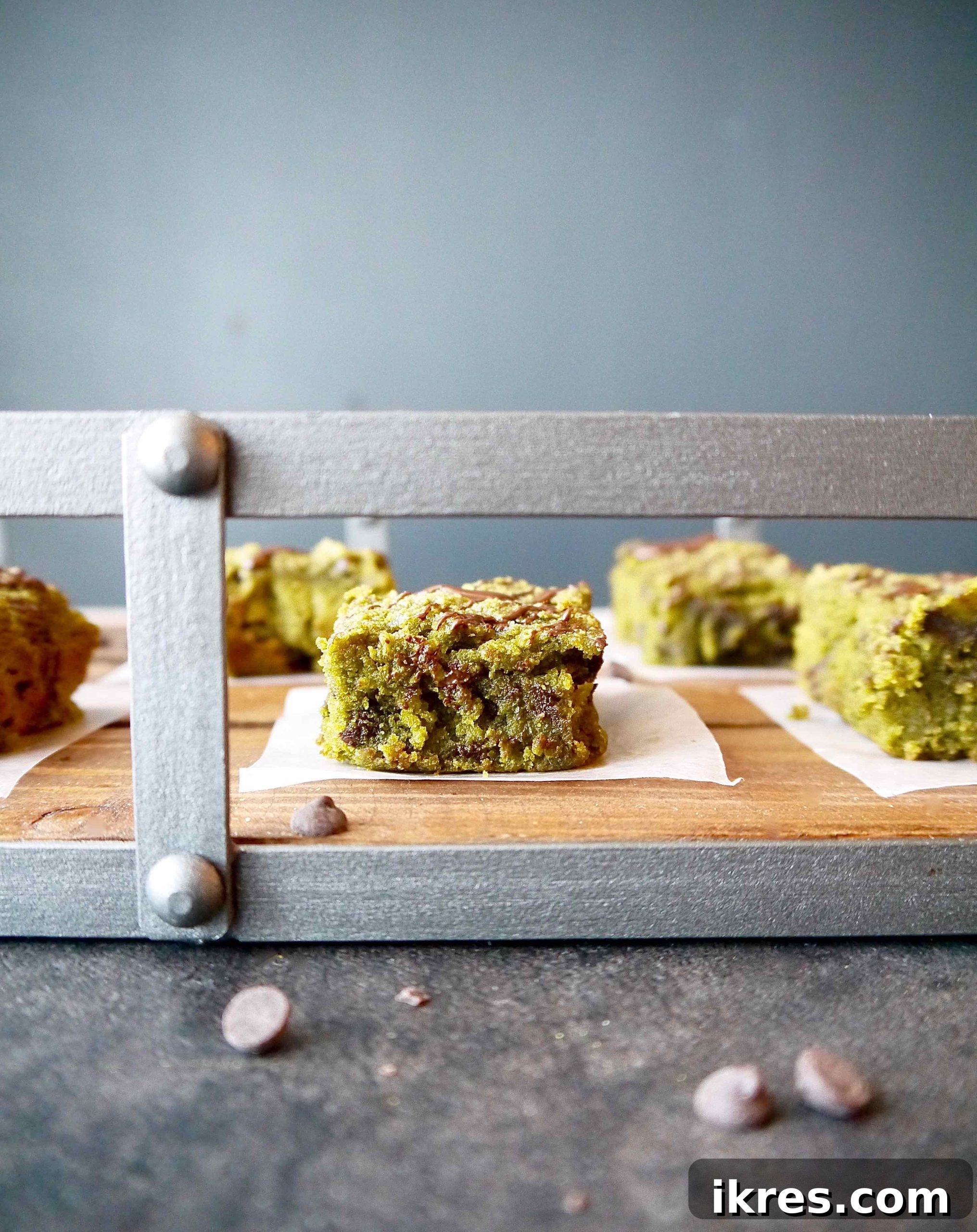 Almond Flour Matcha Brownies: A Paleo, Gluten-Free & Dairy-Free Delight 9 Gluten free matcha brownies in a rustic basket, ready to be served.
