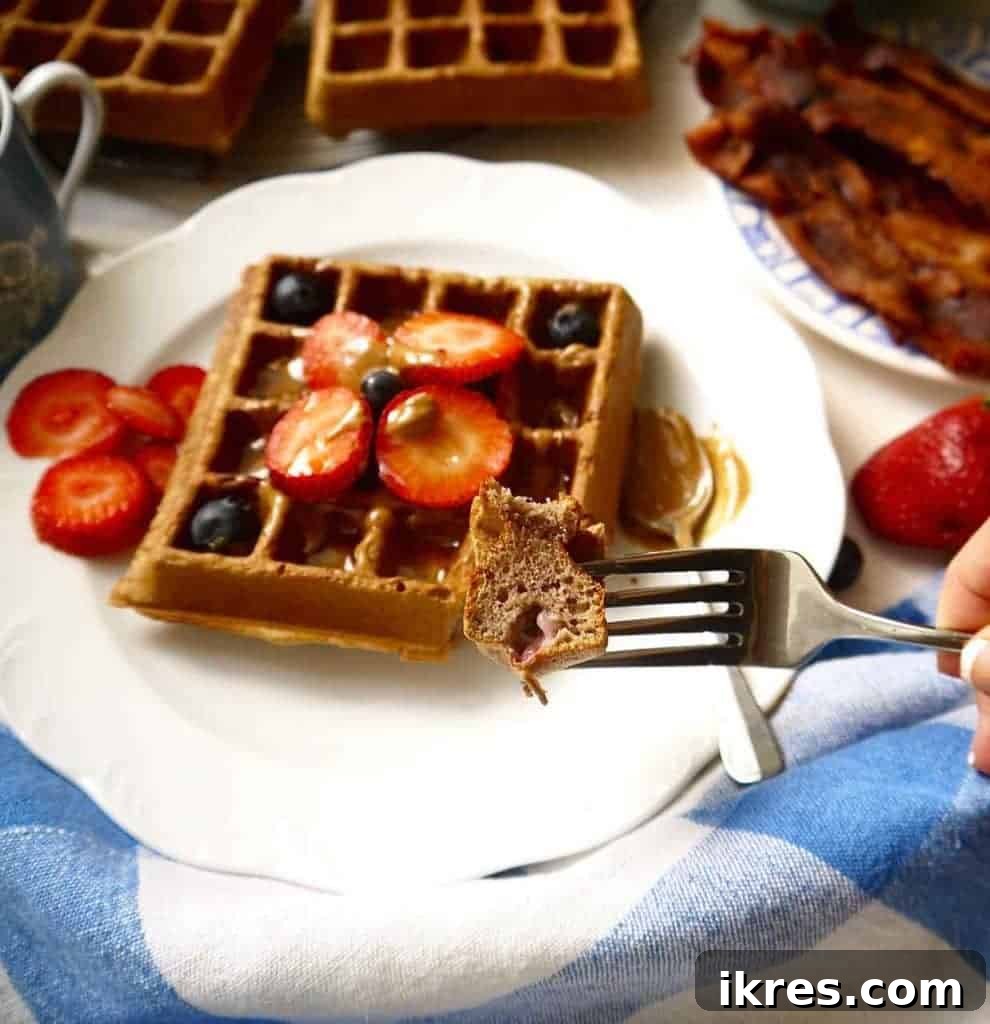 Irresistibly Crispy Paleo Berry Waffles 8 Close-up of a stack of fluffy and crispy Paleo Berry Waffles