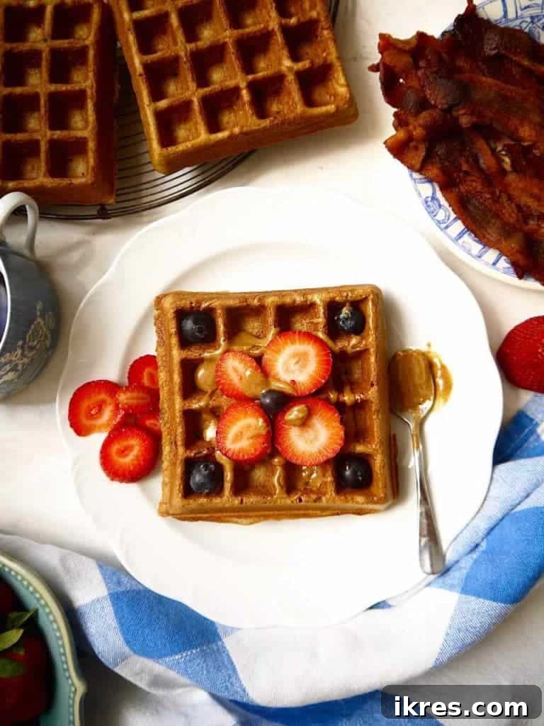 Irresistibly Crispy Paleo Berry Waffles 9 A stack of Crispy-on-the-Outside Paleo Berry Waffles ready to be served