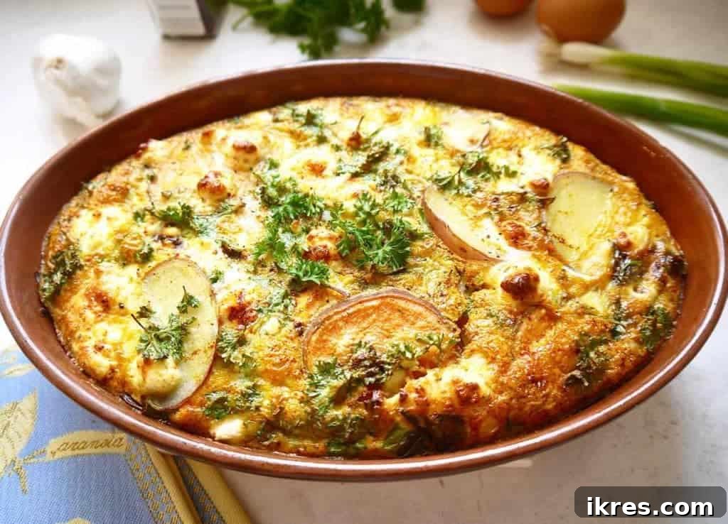 Overhead view of a slice of Paleo Baked Spanish Tortilla