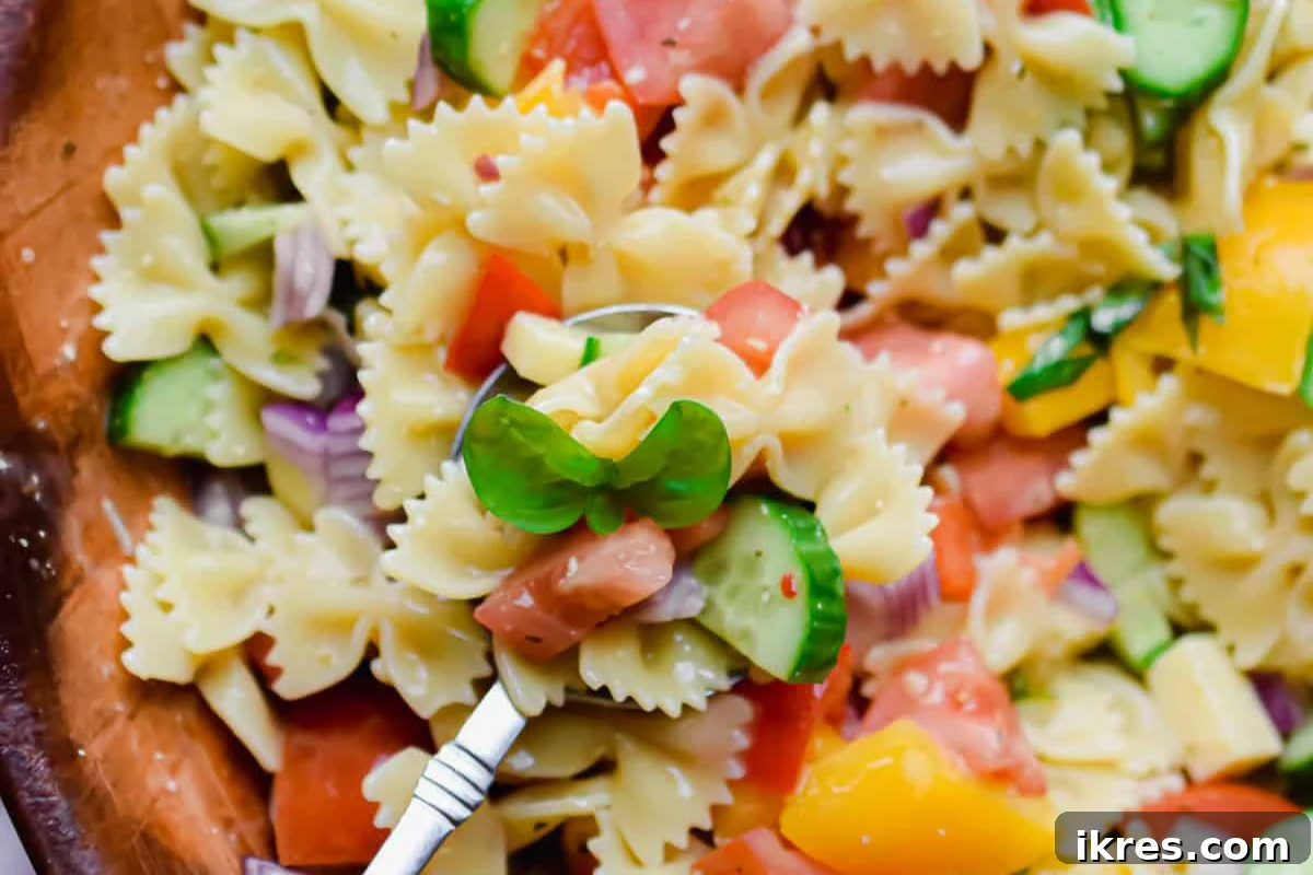 Bowtie Pasta Salad with Italian Dressing, fresh veggies, and al dente pasta