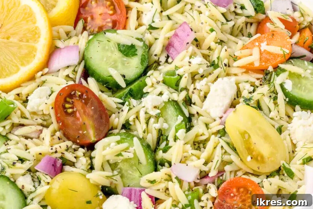 20 Minute Lemon Orzo Salad with Feta, crunchy vegetables, and fresh herbs
