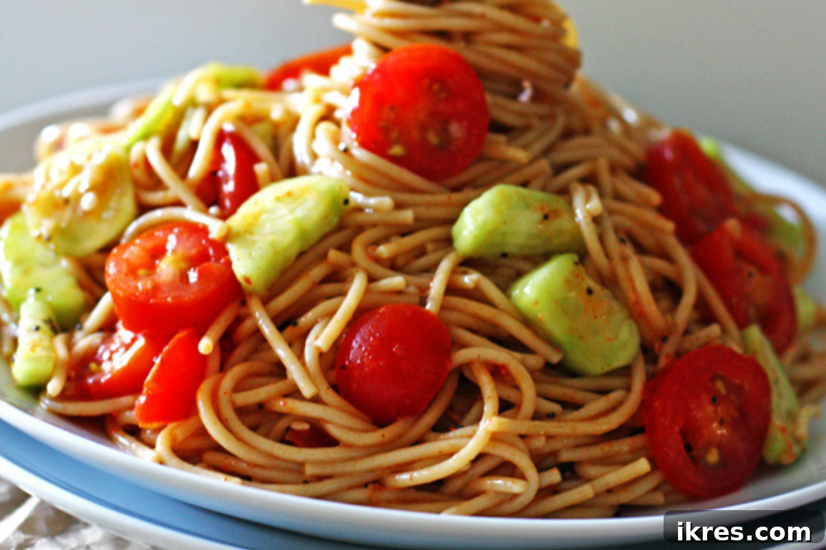 Whole Wheat Pasta Salad with fresh summer vegetables like cucumber and tomatoes