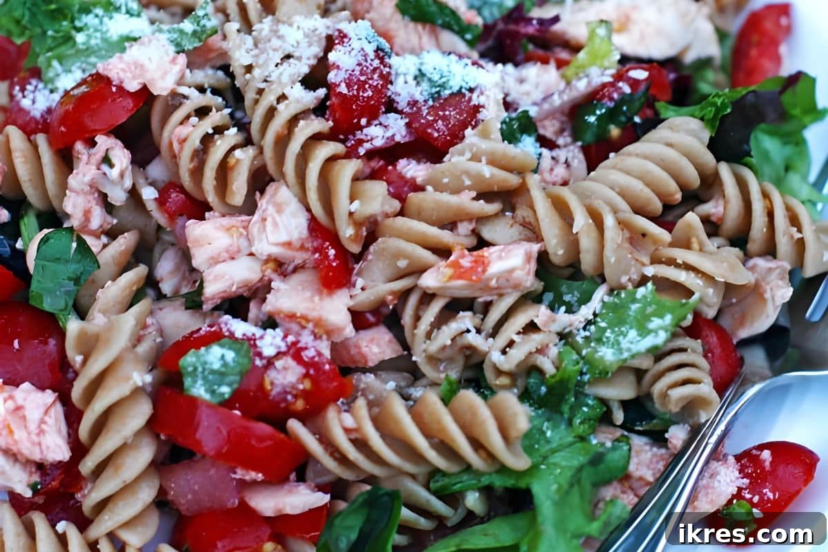 Tomato Basil Chicken Salad with fresh summer tomatoes, basil, chicken, and pasta
