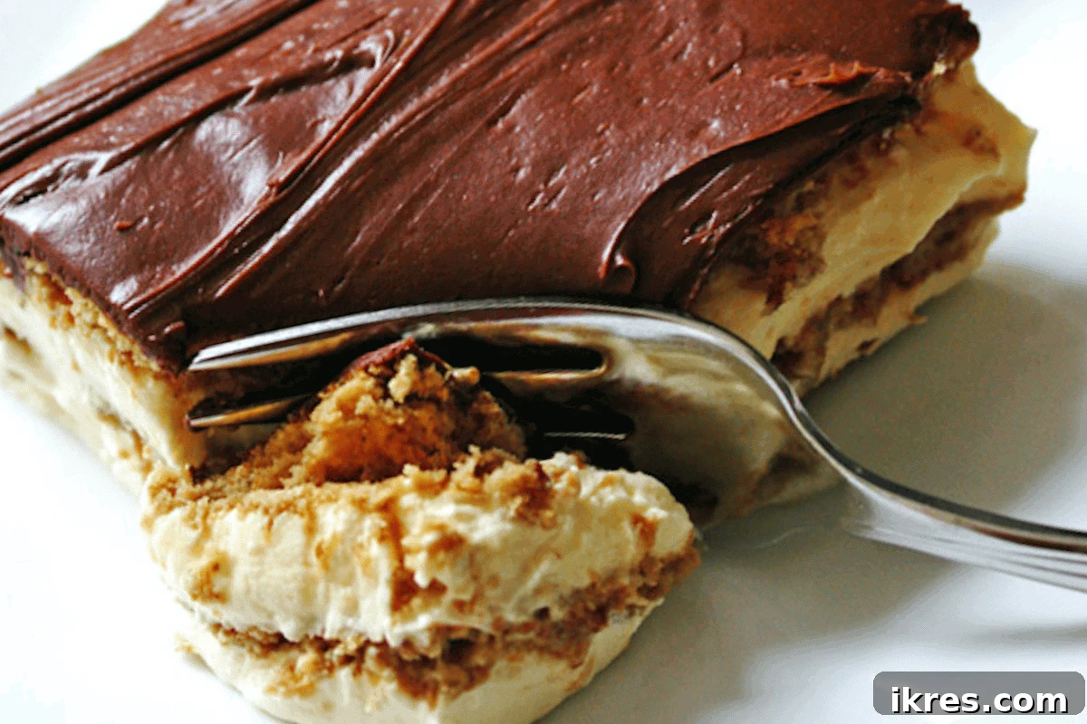 No Oven, No Sweat: 19 Easy Desserts to Cool Your Summer 2 Classic No-Bake Eclair Cake with graham crackers, creamy pudding, and rich chocolate frosting, perfect for summer.