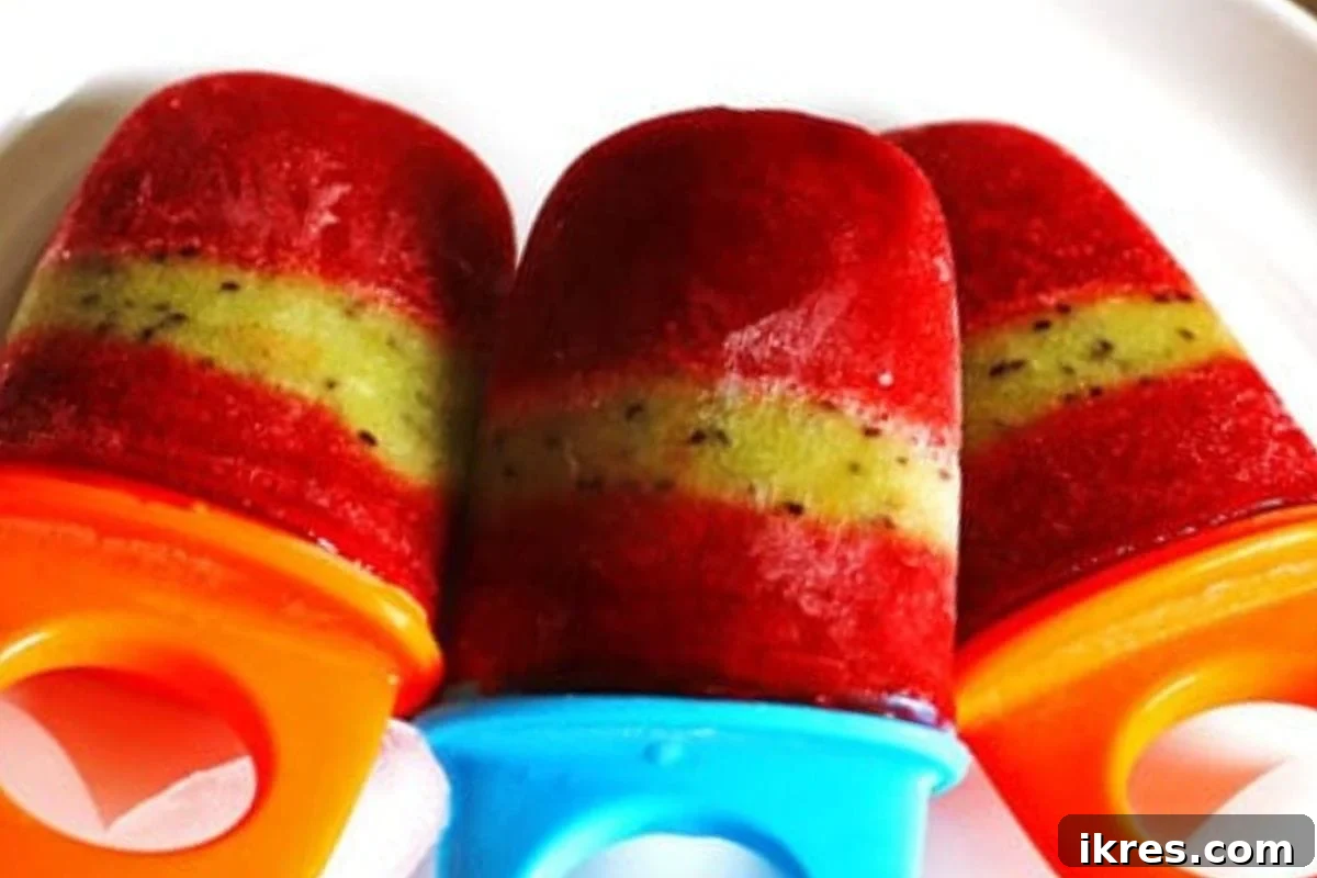 No Oven, No Sweat: 19 Easy Desserts to Cool Your Summer 12 Vibrant and refreshing Homemade Strawberry Kiwi Popsicles, ideal for hot summer days.