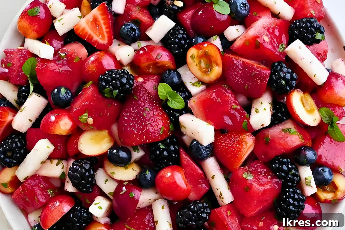 No Oven, No Sweat: 19 Easy Desserts to Cool Your Summer 16 Fresh and colorful Red, White, and Blue Fruit Salad with berries, cherries, and watermelon.