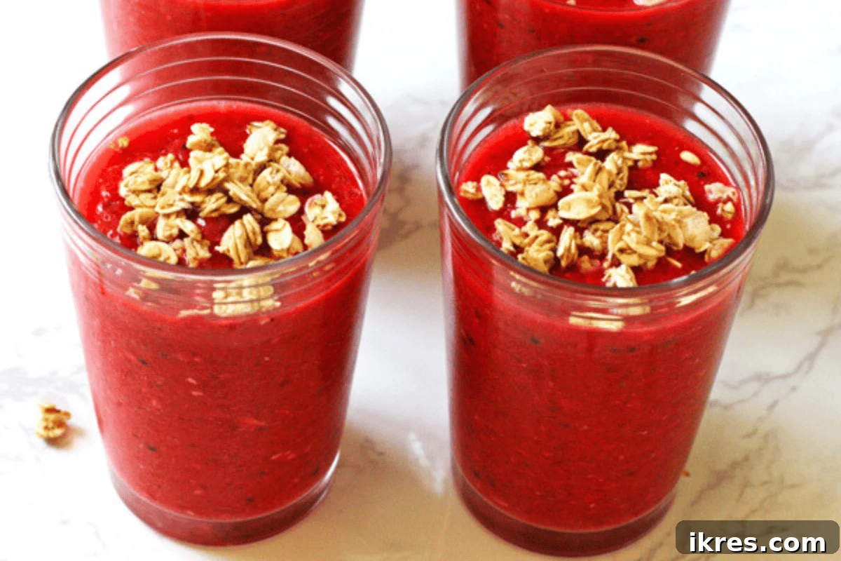 21 Afterschool Snack Hacks Kids Will Devour 16 Berry granola smoothie with a sprinkle of granola on top