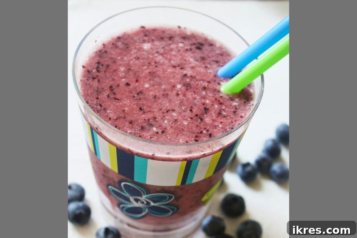 21 Afterschool Snack Hacks Kids Will Devour 17 Creamy blueberry banana peanut butter smoothie in a glass