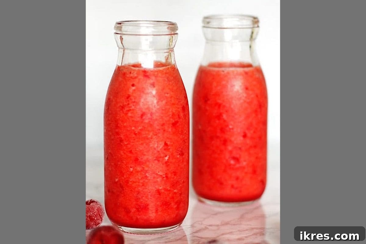 21 Afterschool Snack Hacks Kids Will Devour 20 Tropical cherry pineapple smoothie in a clear glass