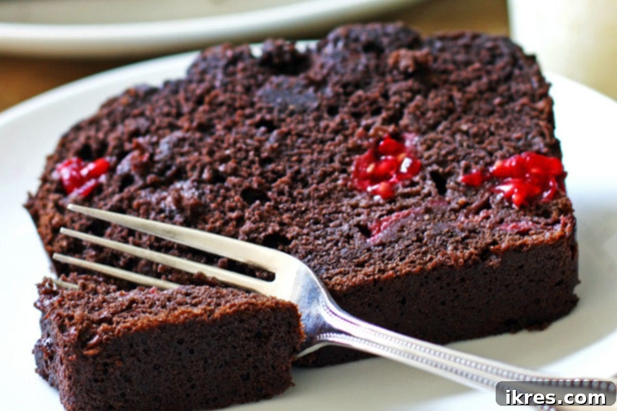Decadent dark chocolate raspberry banana bread, moist and flavorful