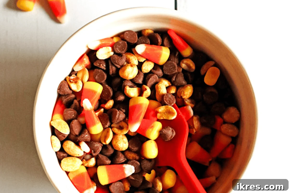 Candy Corn Snack Mix - a sweet and salty blend of candy corn and peanuts, perfect for fall