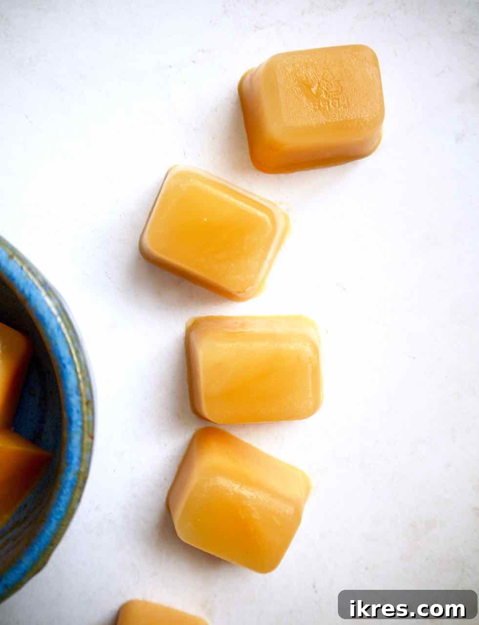Grapefruit sorbet mixture poured into ice cube trays and frozen.