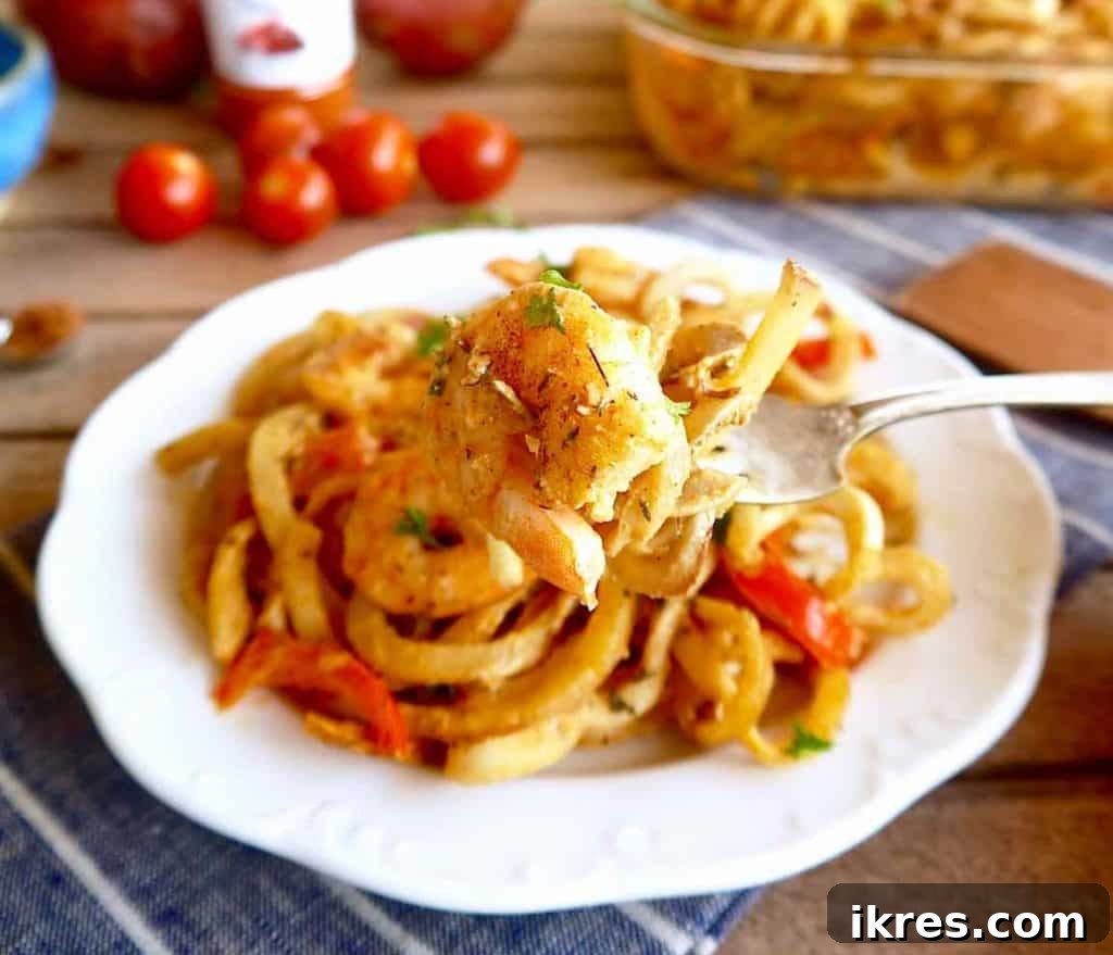 Zesty Cajun Shrimp & Potato Noodle Bake 4 A serving of Cajun Shrimp and Spiralized Potato Casserole, garnished and ready to eat