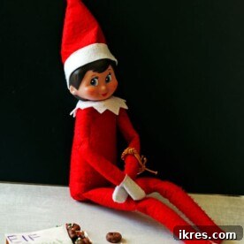 An adorable Elf on the Shelf perched next to a plate of miniature Elf Donuts, perfect for a magical Christmas tradition.