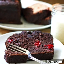 A delectable slice of Dark Chocolate Raspberry Banana Bread, perfect for breakfast or dessert!