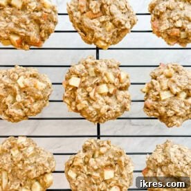 Apple pie breakfast cookies stacked on a plate.