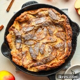 A light and fluffy German apple pancake topped with caramelized apples.