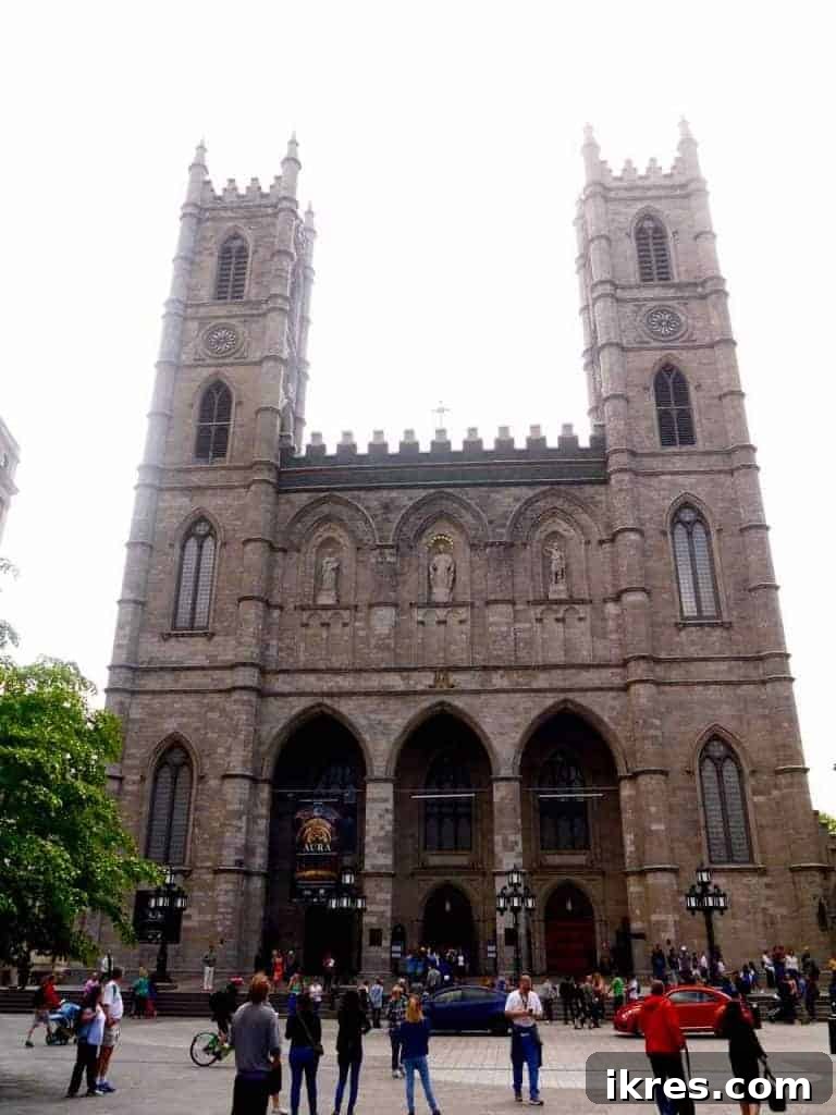 Quebec Destinations Montreal Baie St Paul La Malbaie 16 Grandeur of Notre-Dame Basilica and Paul de Chomedey Statue