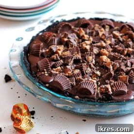 A Chocolate Peanut Butter Cup Pie in a glass baking dish.