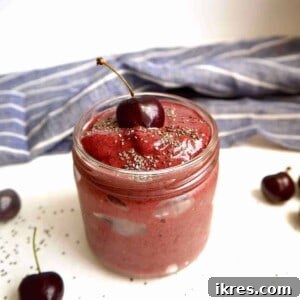 Velvet Chocolate Cherry Banana Delight 6 Chocolate cherry banana smoothie in a jar with chia seeds on top.