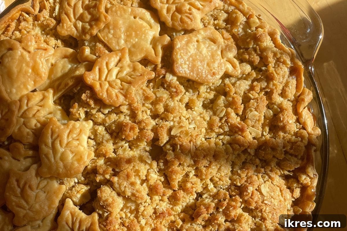 Hearty Dutch Apple Pie with a golden crumb topping.
