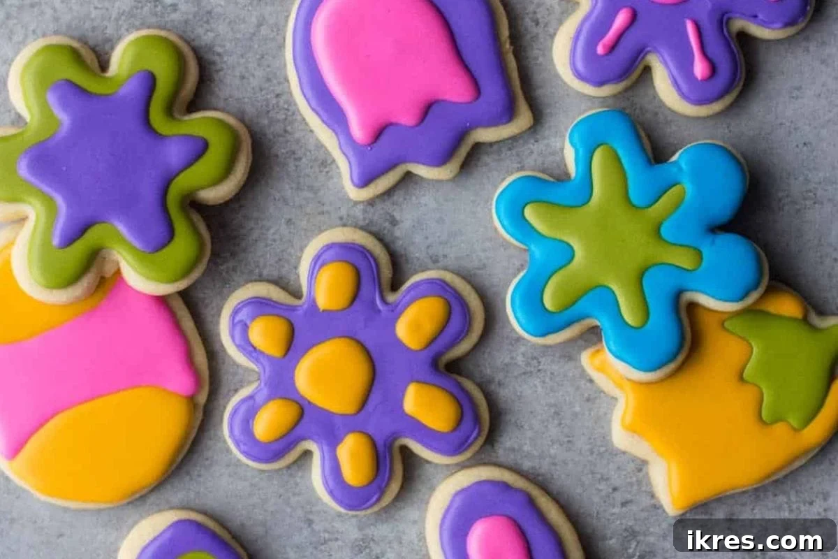 20 Essential Cookie Classics 2 Soft Cut-Out Sugar Cookies ready for decorating, arranged neatly on a cooling rack.