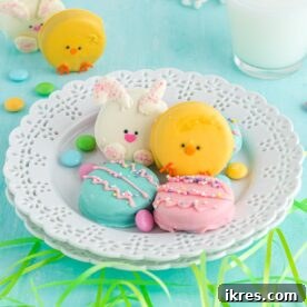 Adorable chocolate-covered Easter Oreos decorated as bunnies, chicks, and eggs, showcasing a simple no-bake recipe perfect for a festive Easter celebration.