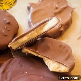 Homemade Reese’s Peanut Butter Eggs, showcasing a perfect balance of sweet, creamy peanut butter and melted chocolate, presented as a fun, cute, and delicious Easter treat.