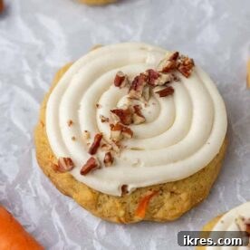 Spiced Crumbl Carrot Cake Cookies, a copycat recipe perfect for Easter, featuring homemade frosting and a delightful blend of warm spices.