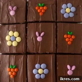 Cute Easter brownies, easily decorated with chocolate frosting and M&M’s, ideal for an easy but adorable Easter dessert using homemade or boxed brownies.