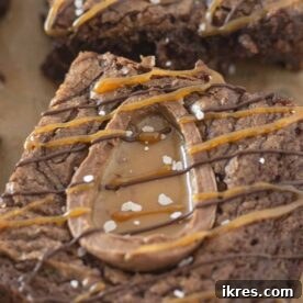 Easy Caramel Easter Egg Brownies, starting with simple fudgy brownies, swirled with caramel, and generously topped with festive egg candies, creating a delicious holiday treat.