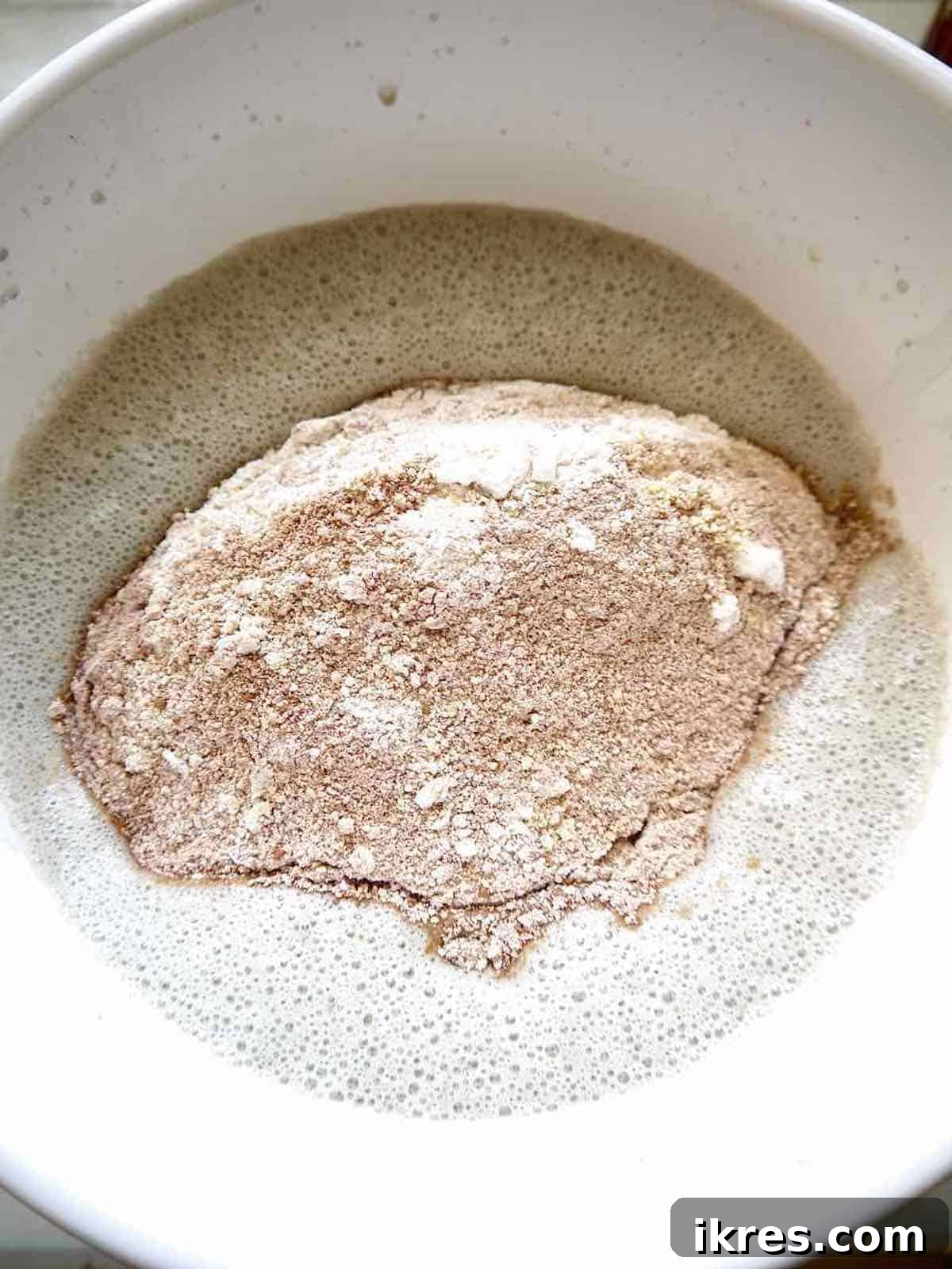 Decadent Grain-Free Chocolate Cherry Waffles 5 Mixing dry ingredients for gluten-free chocolate cherry waffles.