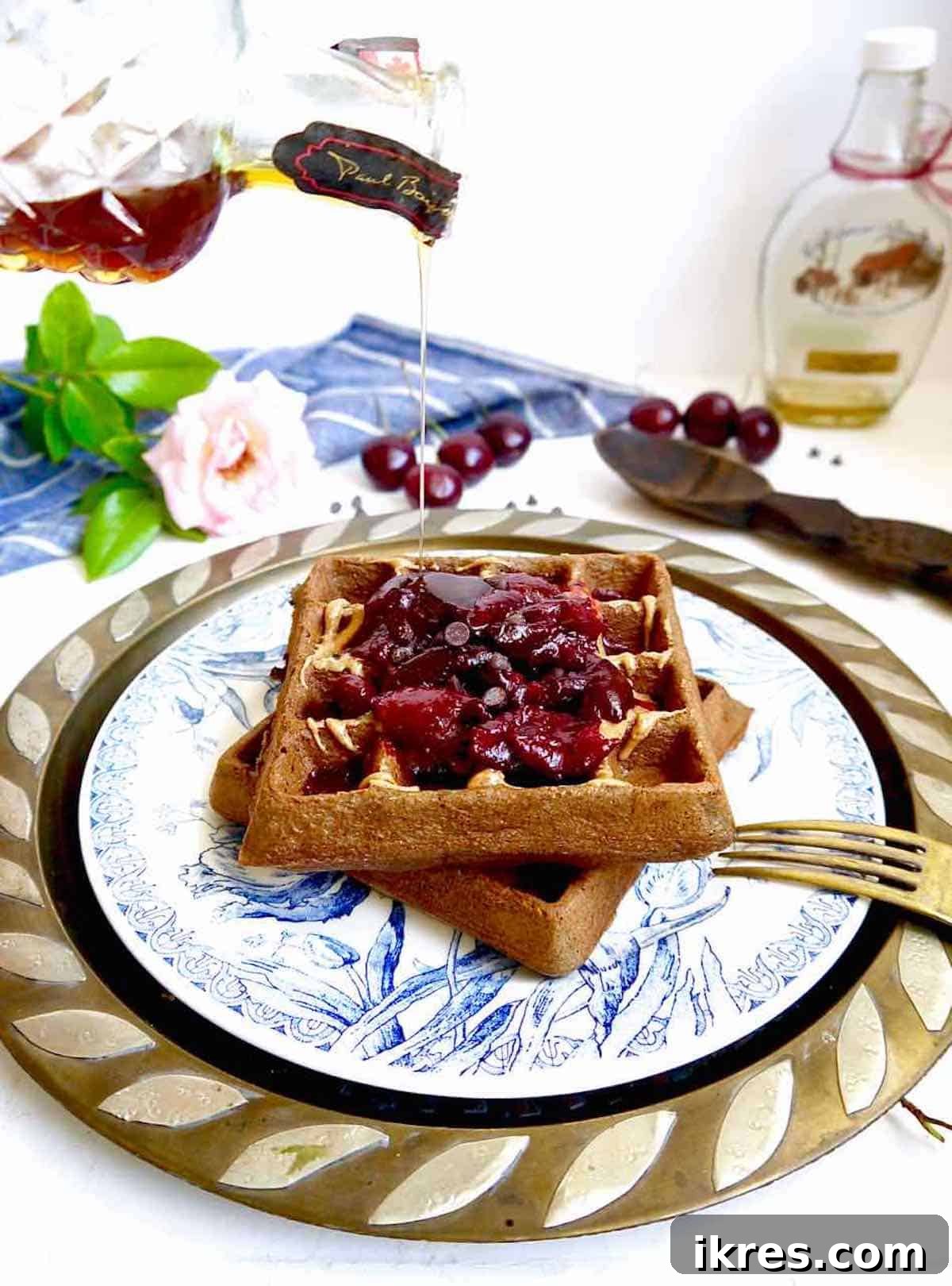Decadent Grain-Free Chocolate Cherry Waffles 6 Paleo waffles with chocolate and cherries.