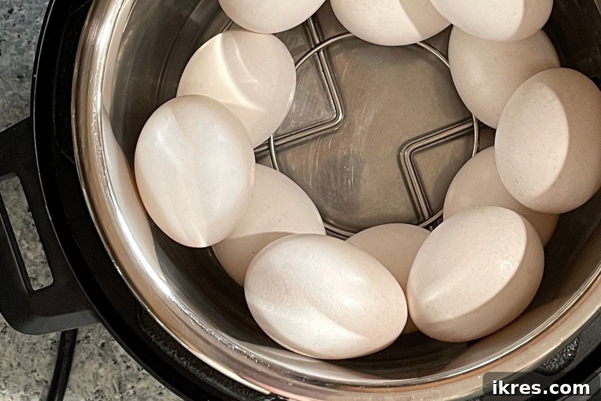 Perfectly cooked Instant Pot Hard-Boiled Eggs, shown peeled and ready.