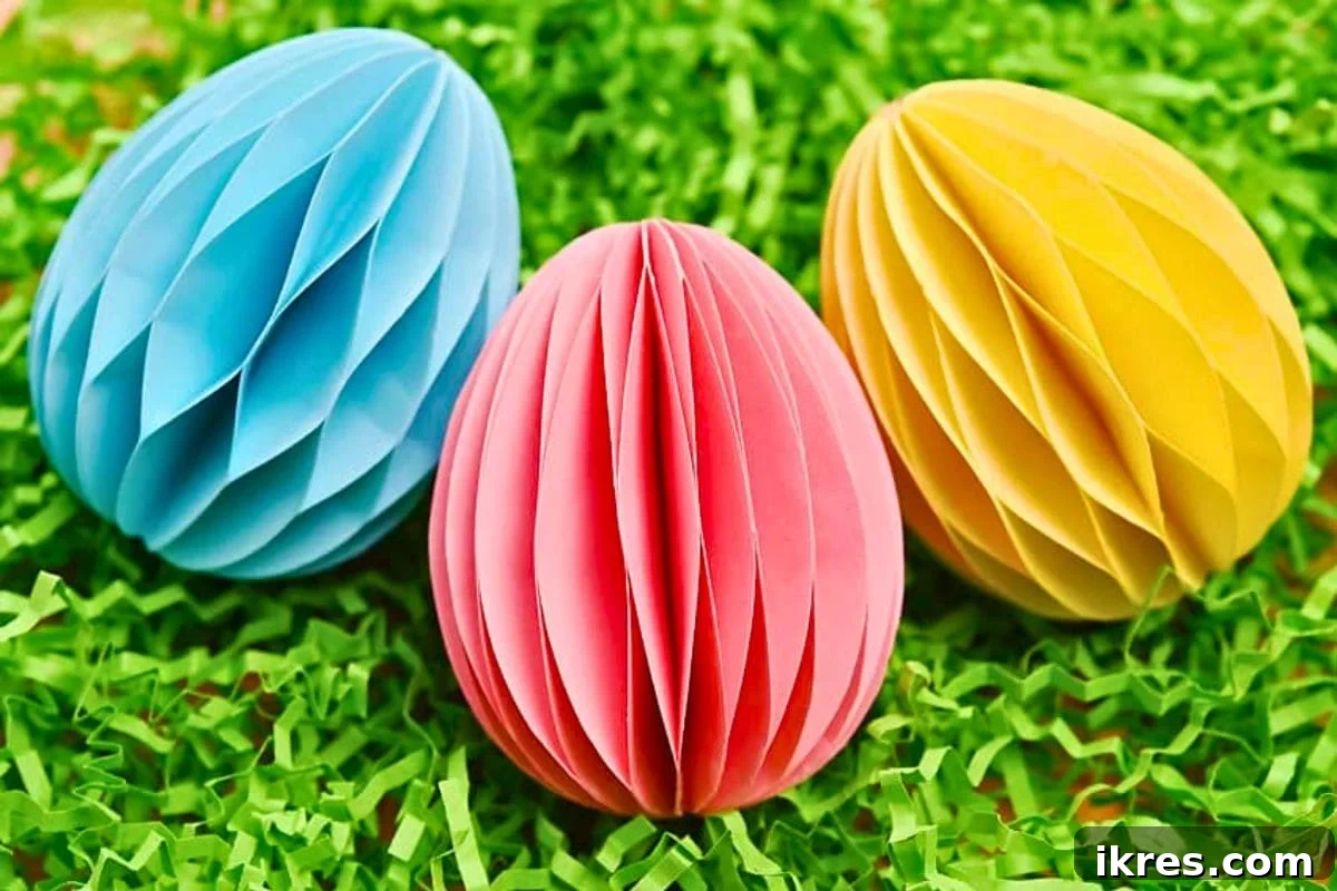 Adorable 3D Honeycomb Easter Eggs crafted from folded paper, perfect for spring decoration.