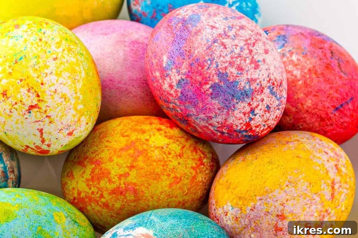 Vibrant Rice Dyed Easter Eggs showcasing a speckled, textured finish.