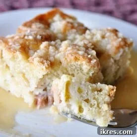 A slice of Rhubarb Streusel Cake, moist and topped with streusel.