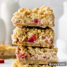 Rhubarb Cream Cheese Bars with a creamy filling and oat crust.
