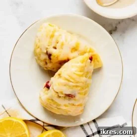Fluffy Lemon Rhubarb Scones with a sweet vanilla glaze.