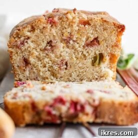 Moist Rhubarb Bread with a crispy cinnamon-sugar topping.