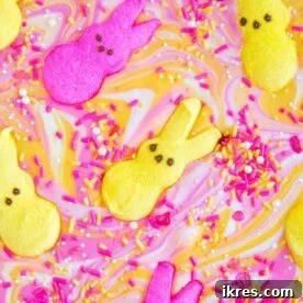 Close-up of vibrant Easter Peeps Bunny Bark with white chocolate and colorful Peeps bunnies.
