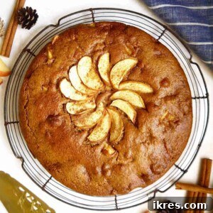 Almond flour apple cake on a drying rack.