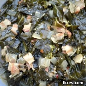 Southern collard greens cooked with bacon and a ham hock.