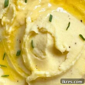 Creamy buttermilk mashed potatoes in a serving bowl.