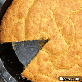 Classic Southern Cornbread cooked in a cast iron skillet.