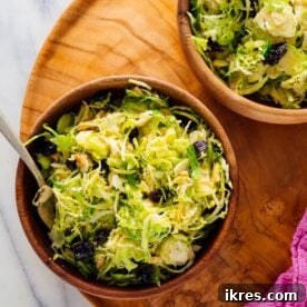 Honey Mustard Brussels Sprout Slaw with toasted almonds and dried cherries.